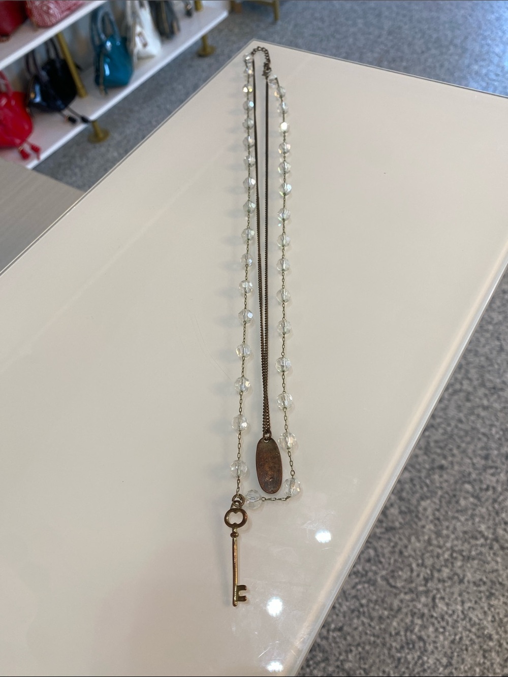 Antique-Style Key Pendant Necklace with Clear Beads